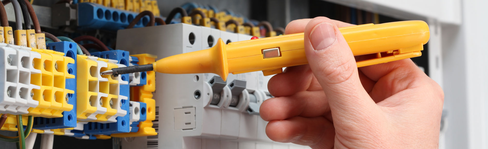 Technician Checking Switchboards