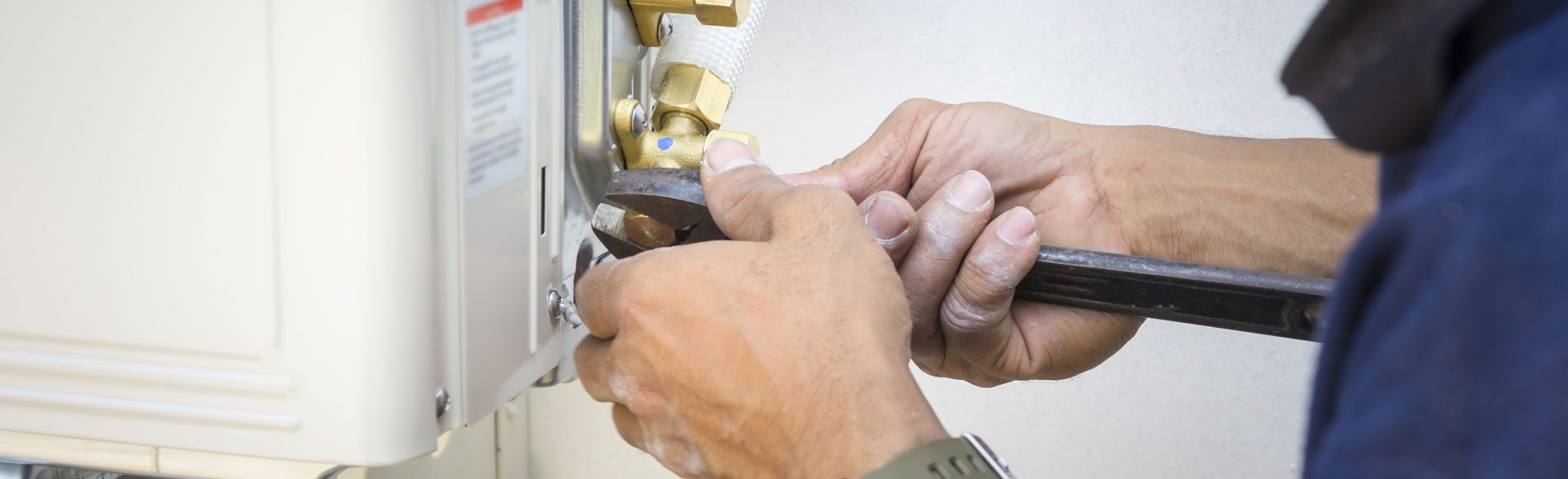 Technician Repairing Air Conditioner